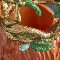 Vase femme aux perroquets en résine