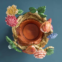 Vase femme aux perroquets en résine
