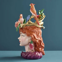 Vase femme aux perroquets en résine