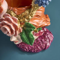 Vase femme aux perroquets en résine