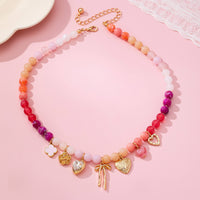 Collier Charme Cœur Fleur Nœud Perlé Pastel