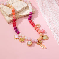 Collier Charme Cœur Fleur Nœud Perlé Pastel